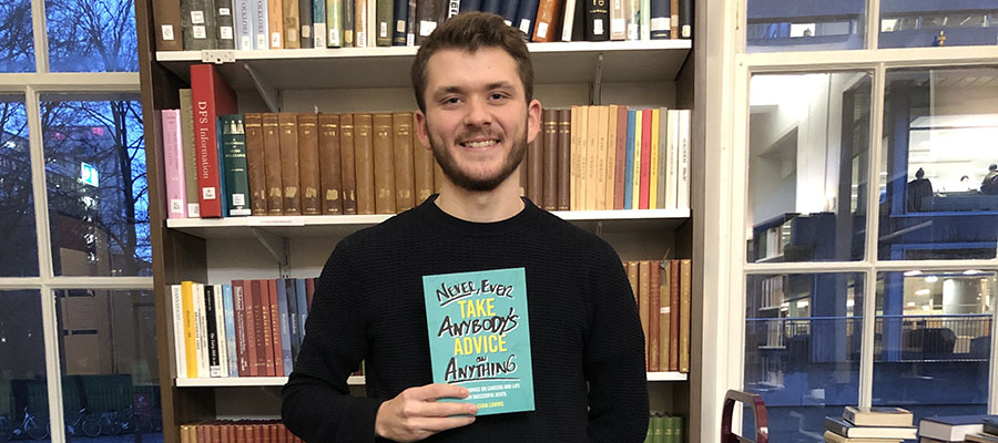 Photo of Euan with book